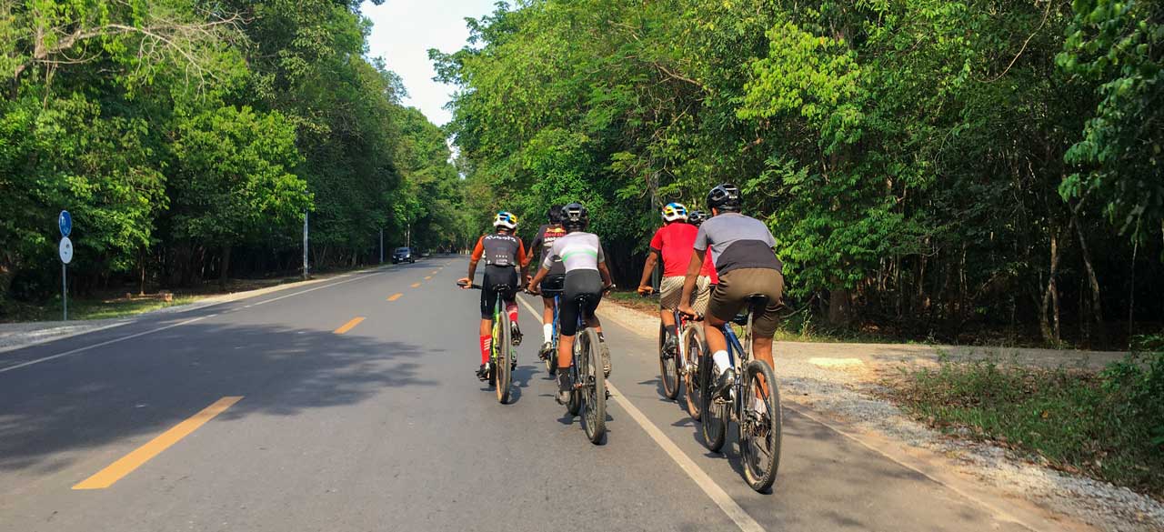 Biker at Angkor Archaeological Park, Best Adventure Activities in Siem Reap